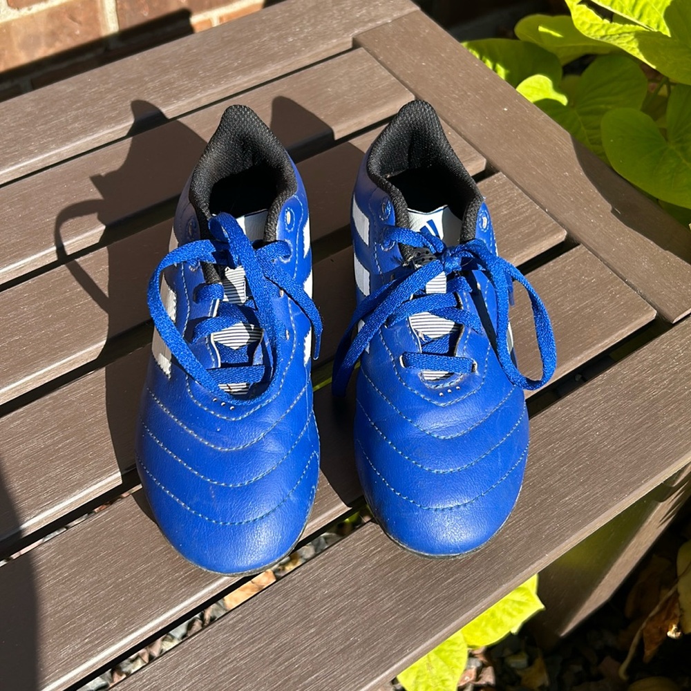 Boys blue soccer cleats used one season size 1